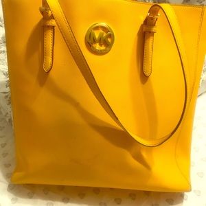 classy yellow hand bag from Michael Kors.